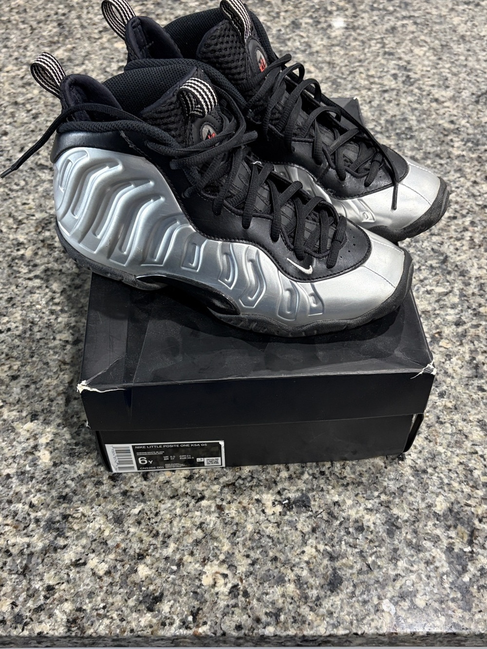 Nike Kids Silver and Black Foamposite Sneakers